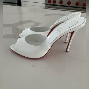 Christian Louboutin Me Dolly white patent shoes